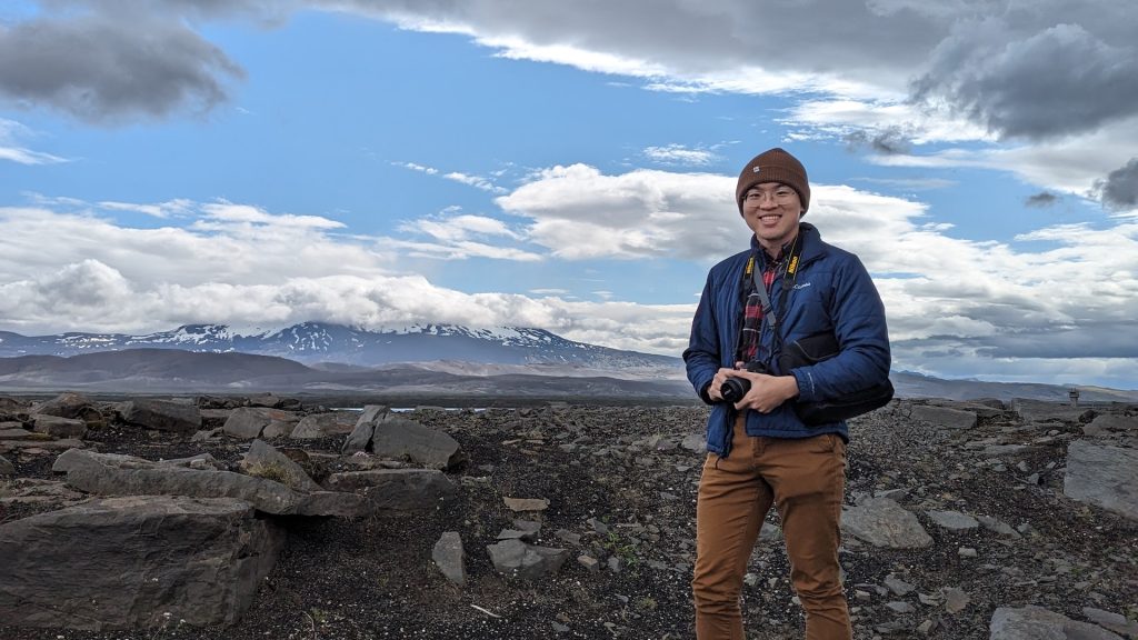 Honors College student standing in front of distant mountains in Iceland